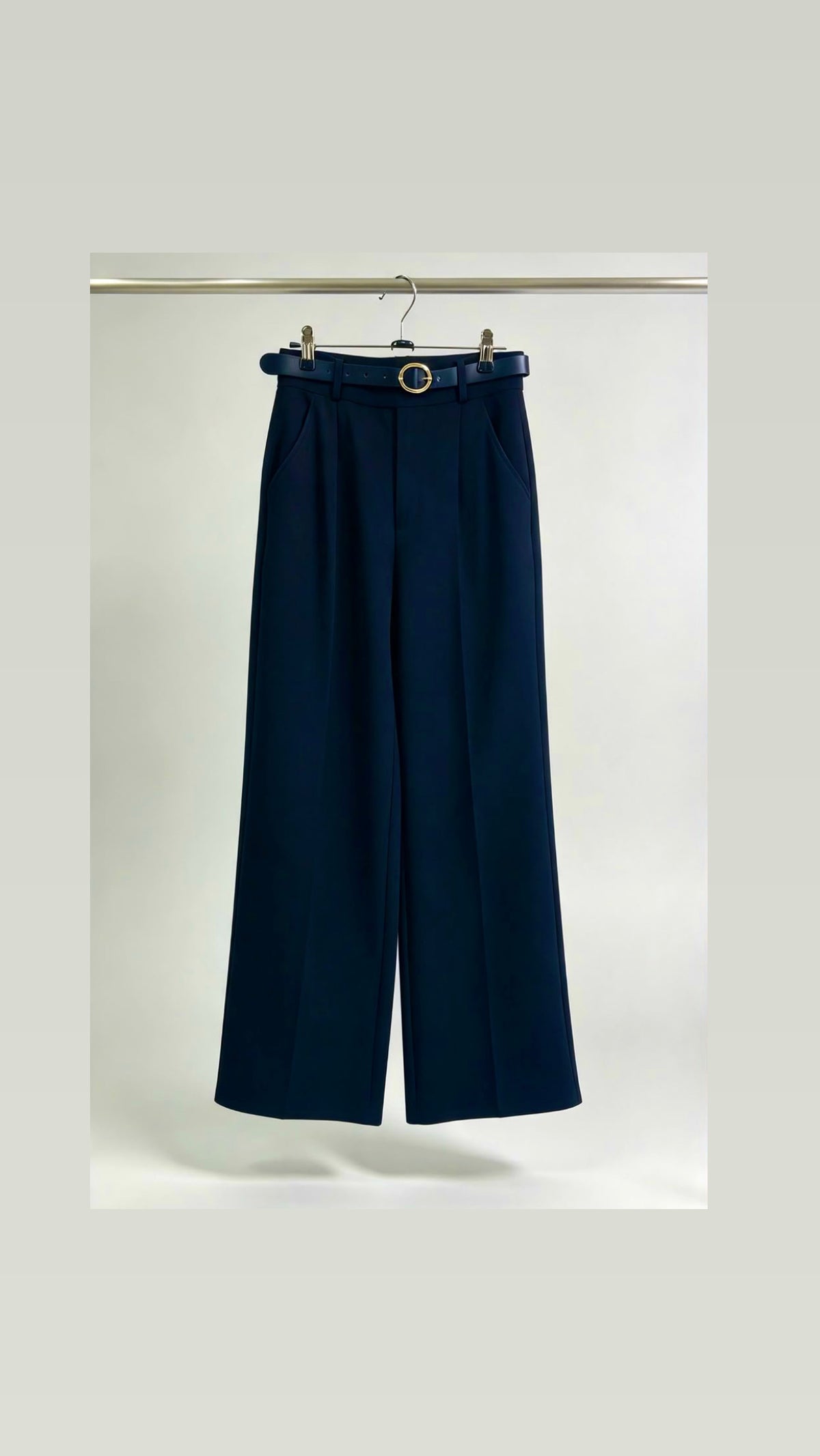 Navy blue belted trousers