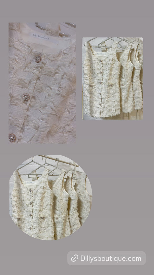 Sleeveless minidress pearl button